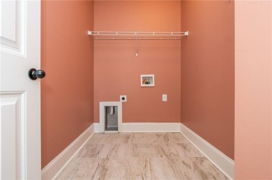 Peaceful living meets modern comfort in this stunning Canton on The Fairways at Laurel Canyon in Georgia - for sale on GolfHomes.com, golf home, golf lot