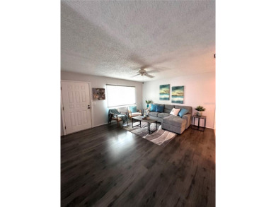 This 2 bedroom 1.5 bath home is located in the 55+ COMMUNITY of on Mainlands Golf Club in Florida - for sale on GolfHomes.com, golf home, golf lot