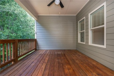 Peaceful living meets modern comfort in this stunning Canton on The Fairways at Laurel Canyon in Georgia - for sale on GolfHomes.com, golf home, golf lot