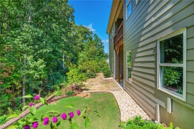 Peaceful living meets modern comfort in this stunning Canton on The Fairways at Laurel Canyon in Georgia - for sale on GolfHomes.com, golf home, golf lot