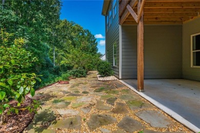 Peaceful living meets modern comfort in this stunning Canton on The Fairways at Laurel Canyon in Georgia - for sale on GolfHomes.com, golf home, golf lot