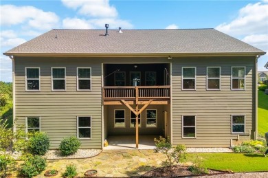 Peaceful living meets modern comfort in this stunning Canton on The Fairways at Laurel Canyon in Georgia - for sale on GolfHomes.com, golf home, golf lot