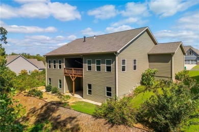 Peaceful living meets modern comfort in this stunning Canton on The Fairways at Laurel Canyon in Georgia - for sale on GolfHomes.com, golf home, golf lot