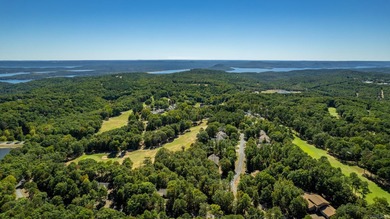 Sitting on three lots.  This Immaculate 3-bedroom, 2-bath home on Mountain Ranch Golf Club in Arkansas - for sale on GolfHomes.com, golf home, golf lot