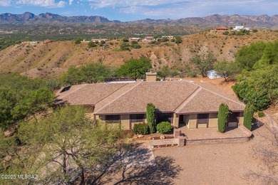 This charming home in Rio Rico, Arizona offers breathtaking on Rio Rico Resort and Country Club in Arizona - for sale on GolfHomes.com, golf home, golf lot