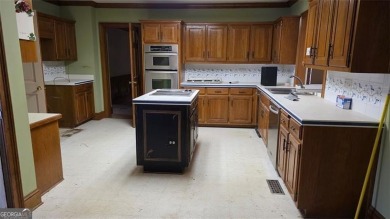 Welcome to 865 Ferncroft Ct, nestled in the prestigious on Brookfield Country Club in Georgia - for sale on GolfHomes.com, golf home, golf lot