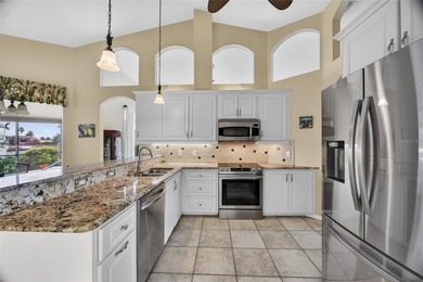 BEST INTERSECTING CANAL VIEWS IN PUNTA GORDA ISLES! BEAUTIFUL 3 on Saint Andrews South Golf Club in Florida - for sale on GolfHomes.com, golf home, golf lot