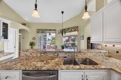 BEST INTERSECTING CANAL VIEWS IN PUNTA GORDA ISLES! BEAUTIFUL 3 on Saint Andrews South Golf Club in Florida - for sale on GolfHomes.com, golf home, golf lot