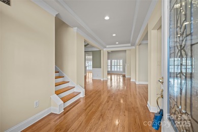 Beautiful all-brick, 3-level home located on the 13th tee of the on Waterford Golf Club in South Carolina - for sale on GolfHomes.com, golf home, golf lot