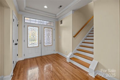 Beautiful all-brick, 3-level home located on the 13th tee of the on Waterford Golf Club in South Carolina - for sale on GolfHomes.com, golf home, golf lot