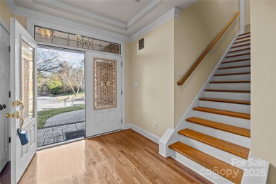 Beautiful all-brick, 3-level home located on the 13th tee of the on Waterford Golf Club in South Carolina - for sale on GolfHomes.com, golf home, golf lot