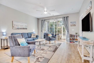 Welcome to this rare first-floor end unit in highly sought-after on Barefoot Resort and Golf Club  in South Carolina - for sale on GolfHomes.com, golf home, golf lot