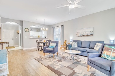 Welcome to this rare first-floor end unit in highly sought-after on Barefoot Resort and Golf Club  in South Carolina - for sale on GolfHomes.com, golf home, golf lot