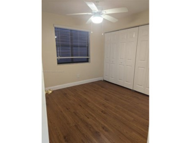 BUYER COULD NOT SECURE FINANCING !  CLEAN 2 BEDROOM WITH 2 on Pembroke Lakes Golf Club in  - for sale on GolfHomes.com, golf home, golf lot