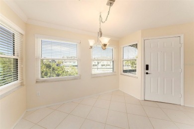 Welcome to this beautiful 2nd floor end unit condo at Audubon in on Feather Sound Country Club in Florida - for sale on GolfHomes.com, golf home, golf lot