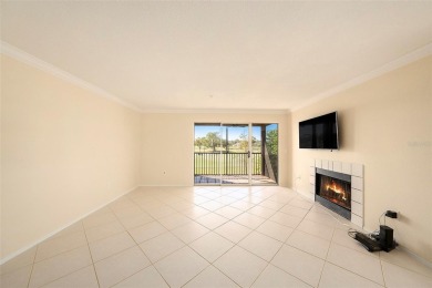 Welcome to this beautiful 2nd floor end unit condo at Audubon in on Feather Sound Country Club in Florida - for sale on GolfHomes.com, golf home, golf lot