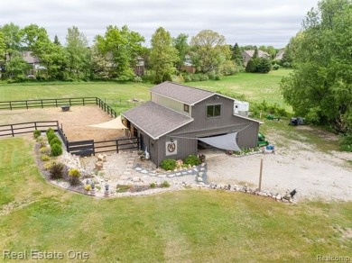 Nestled at end of a cul-de-sac this Spectacular-Built Home is on Prestwick Village Golf Club in Michigan - for sale on GolfHomes.com, golf home, golf lot
