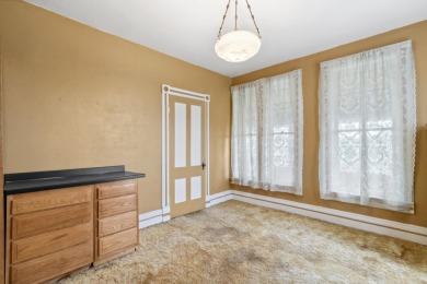 Step into a piece of history with this enchanting 1880s-era home on Mayville Golf Club in Wisconsin - for sale on GolfHomes.com, golf home, golf lot