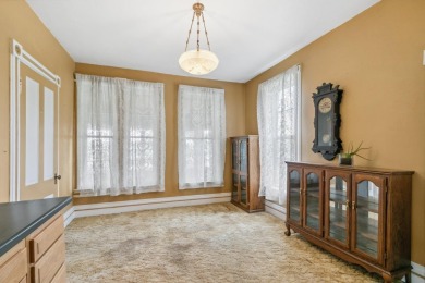 Step into a piece of history with this enchanting 1880s-era home on Mayville Golf Club in Wisconsin - for sale on GolfHomes.com, golf home, golf lot