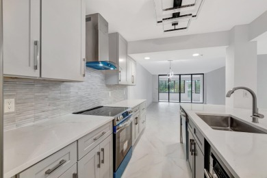 This is a must see!! Completely redone.Gorgeous fully remodeled on The Country Club At Boca Raton in Florida - for sale on GolfHomes.com, golf home, golf lot