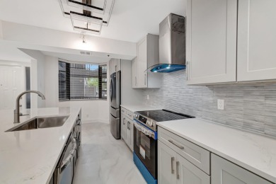 This is a must see!! Completely redone.Gorgeous fully remodeled on The Country Club At Boca Raton in Florida - for sale on GolfHomes.com, golf home, golf lot