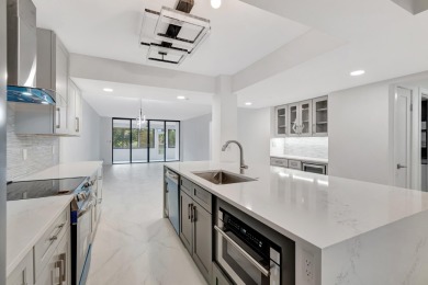 This is a must see!! Completely redone.Gorgeous fully remodeled on The Country Club At Boca Raton in Florida - for sale on GolfHomes.com, golf home, golf lot