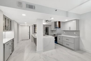 This is a must see!! Completely redone.Gorgeous fully remodeled on The Country Club At Boca Raton in Florida - for sale on GolfHomes.com, golf home, golf lot