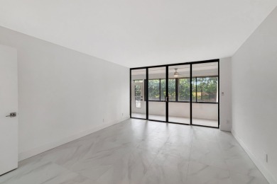 This is a must see!! Completely redone.Gorgeous fully remodeled on The Country Club At Boca Raton in Florida - for sale on GolfHomes.com, golf home, golf lot