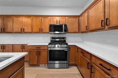 Totally remodeled in 2025 2 bedroom, 2.1 bath condo in Cascades on Stony Creek Metropark Golf Course in Michigan - for sale on GolfHomes.com, golf home, golf lot