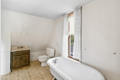 Step into a piece of history with this enchanting 1880s-era home on Mayville Golf Club in Wisconsin - for sale on GolfHomes.com, golf home, golf lot