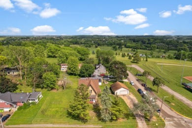 Step into a piece of history with this enchanting 1880s-era home on Mayville Golf Club in Wisconsin - for sale on GolfHomes.com, golf home, golf lot