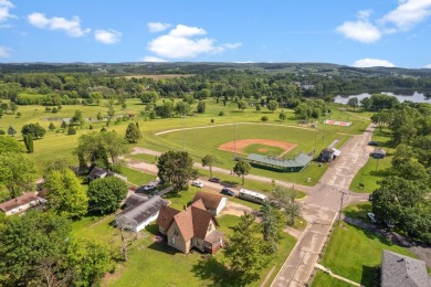 Step into a piece of history with this enchanting 1880s-era home on Mayville Golf Club in Wisconsin - for sale on GolfHomes.com, golf home, golf lot
