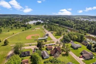 Step into a piece of history with this enchanting 1880s-era home on Mayville Golf Club in Wisconsin - for sale on GolfHomes.com, golf home, golf lot