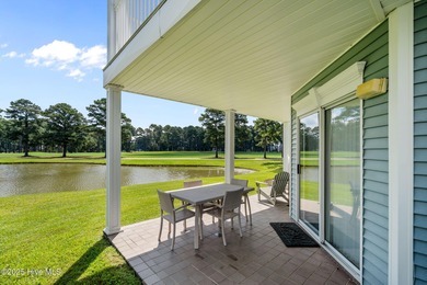 Step into coastal comfort with this spacious, 2-bedroom, 2-bath on Brunswick Plantation and Golf Resorts in North Carolina - for sale on GolfHomes.com, golf home, golf lot