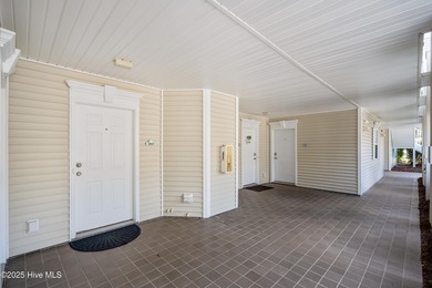 Step into coastal comfort with this spacious, 2-bedroom, 2-bath on Brunswick Plantation and Golf Resorts in North Carolina - for sale on GolfHomes.com, golf home, golf lot