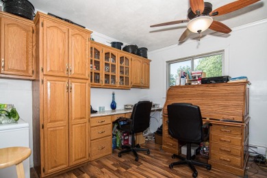 NEW IMPROVEMENTS - Freshly painted and NEW windows throughout on Dubuque Golf and Country Club in Iowa - for sale on GolfHomes.com, golf home, golf lot