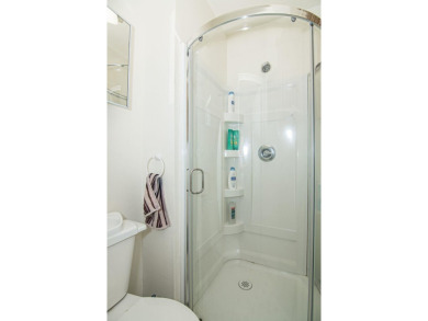 NEW IMPROVEMENTS - Freshly painted and NEW windows throughout on Dubuque Golf and Country Club in Iowa - for sale on GolfHomes.com, golf home, golf lot