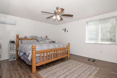 NEW IMPROVEMENTS - Freshly painted and NEW windows throughout on Dubuque Golf and Country Club in Iowa - for sale on GolfHomes.com, golf home, golf lot