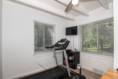 NEW IMPROVEMENTS - Freshly painted and NEW windows throughout on Dubuque Golf and Country Club in Iowa - for sale on GolfHomes.com, golf home, golf lot