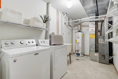 Move right in and enjoy easy Stillwater living with thoughtful on Loggers Trail Golf Club in Minnesota - for sale on GolfHomes.com, golf home, golf lot