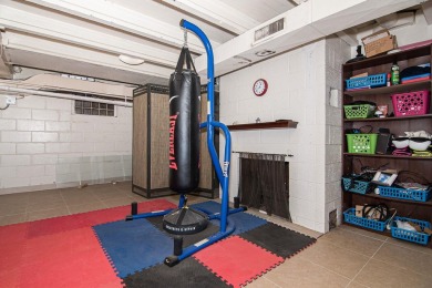 NEW IMPROVEMENTS - Freshly painted and NEW windows throughout on Dubuque Golf and Country Club in Iowa - for sale on GolfHomes.com, golf home, golf lot