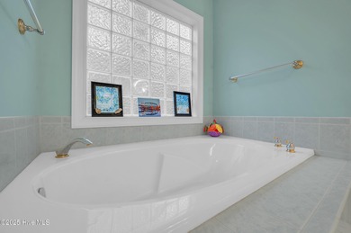 Welcome to this stunning 4 bed 3.5 bath home perfectly on Olde Point Golf and Country Club in North Carolina - for sale on GolfHomes.com, golf home, golf lot