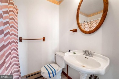 Coastal Cottage Charm Meets Everyday Comfort Across from the on The Links At Brigantine Beach in New Jersey - for sale on GolfHomes.com, golf home, golf lot