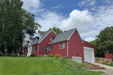 NEW IMPROVEMENTS - Freshly painted and NEW windows throughout on Dubuque Golf and Country Club in Iowa - for sale on GolfHomes.com, golf home, golf lot