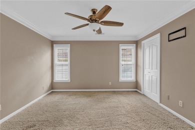 Located on the 3rd hole of Brookstone Country Club, this on Brookstone Golf and Country Club in Georgia - for sale on GolfHomes.com, golf home, golf lot