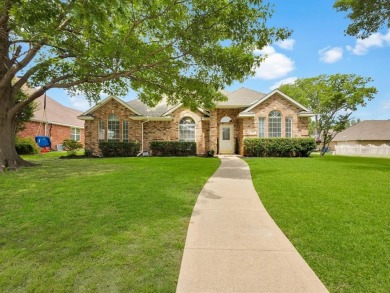 Welcome to this beautifully maintained 4-bedroom, 2-bathroom on Firewheel Golf Park in Texas - for sale on GolfHomes.com, golf home, golf lot