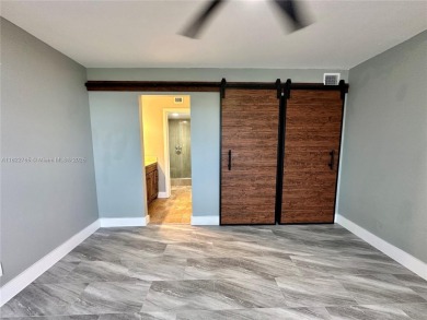 Cash only. Move-in ready 2-bedroom, 2-bathroom condo in a gated on Inverrary Country Club in Florida - for sale on GolfHomes.com, golf home, golf lot