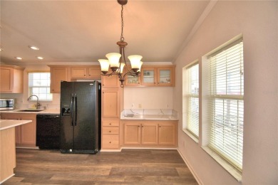 LOOK NO FURTHER...FLORIDA LIFESTYLE AT ITS BEST! THIS 2012 on Southern Dunes Golf and Country Club in Florida - for sale on GolfHomes.com, golf home, golf lot
