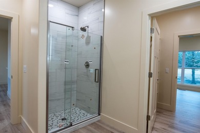 Luxury condominium located on Cooper's Hawk Golf Course on Coopers Hawk in Arkansas - for sale on GolfHomes.com, golf home, golf lot