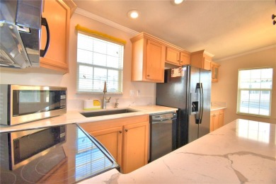 LOOK NO FURTHER...FLORIDA LIFESTYLE AT ITS BEST! THIS 2012 on Southern Dunes Golf and Country Club in Florida - for sale on GolfHomes.com, golf home, golf lot